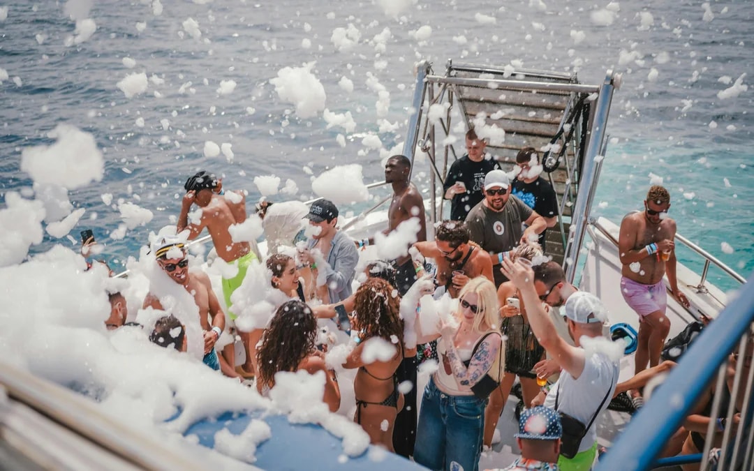 Ibiza Catamaran Boat Party with DJ Open Bar and Swim Stop Image 4