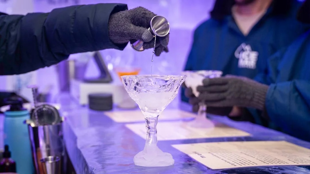 Pouring drink into ice glass at IceBar Surfers Paradise.