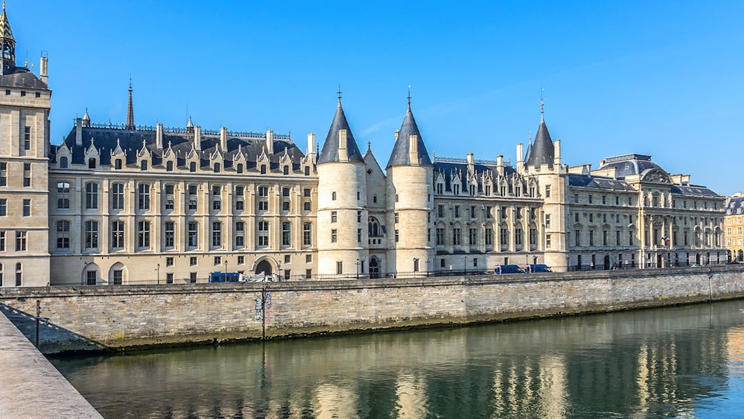 Conciergerie Paris historic building along the Seine River.