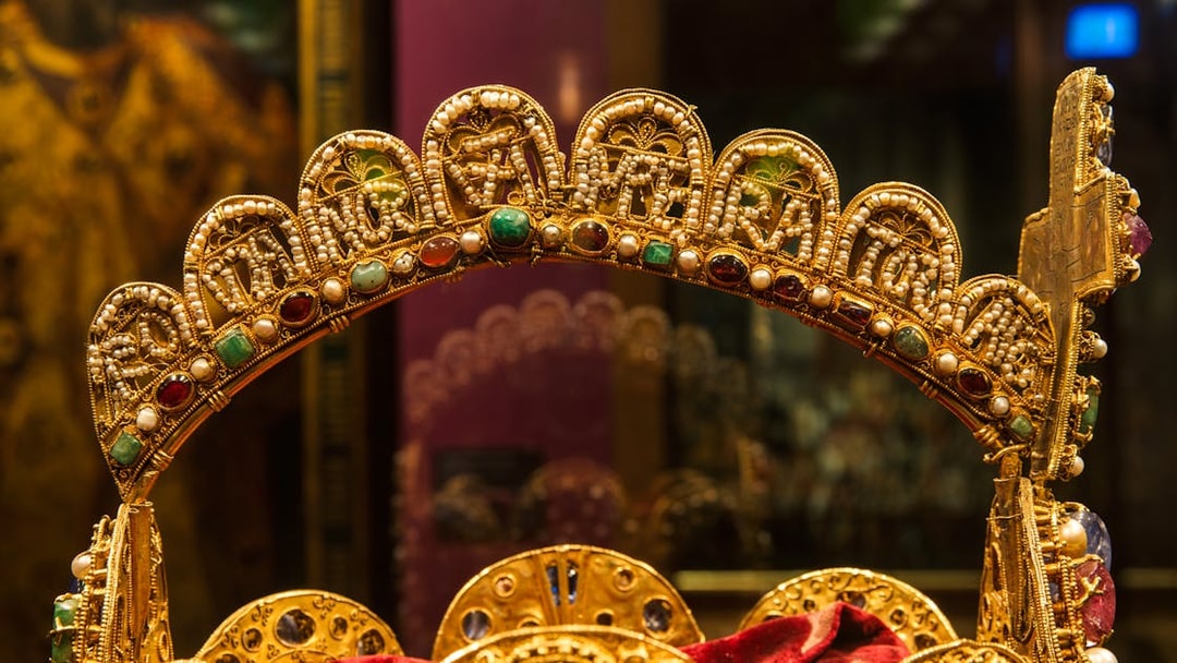 Golden crown with jewels at Imperial Treasury Vienna.