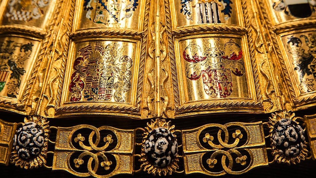 Golden ornate details of a ceremonial robe at the Imperial Treasury, Vienna.