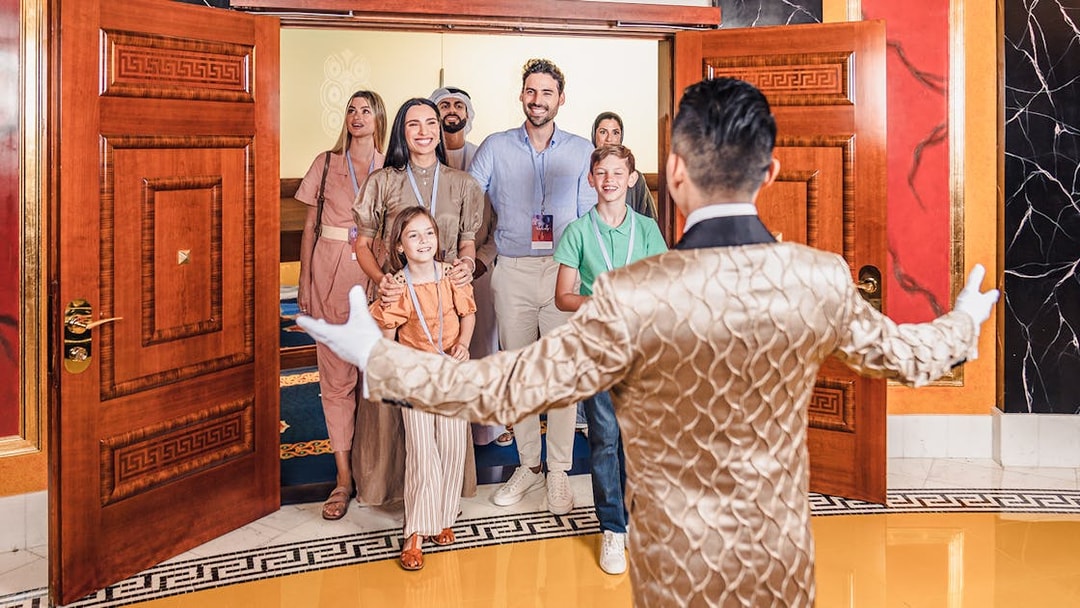 Butler welcoming guests inside Burj Al Arab, Dubai tour.