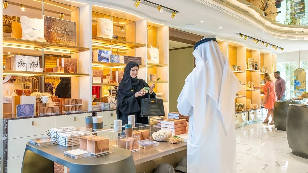 Guests exploring a gift shop during a guided tour inside Burj Al Arab, Dubai.