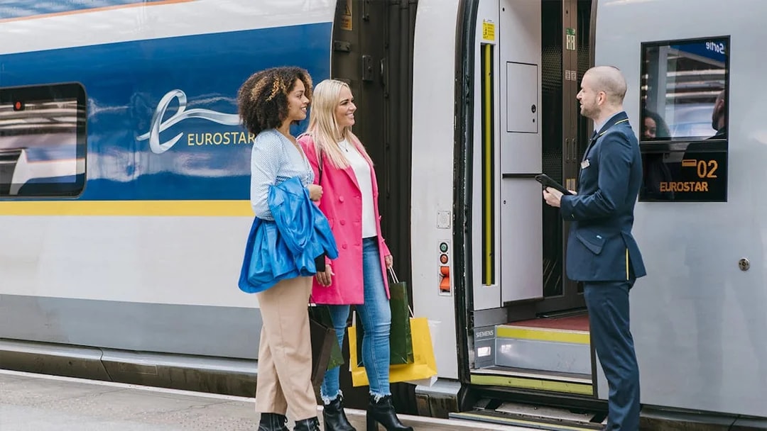 Travellers boarding Eurostar train with Interrail Global Pass.