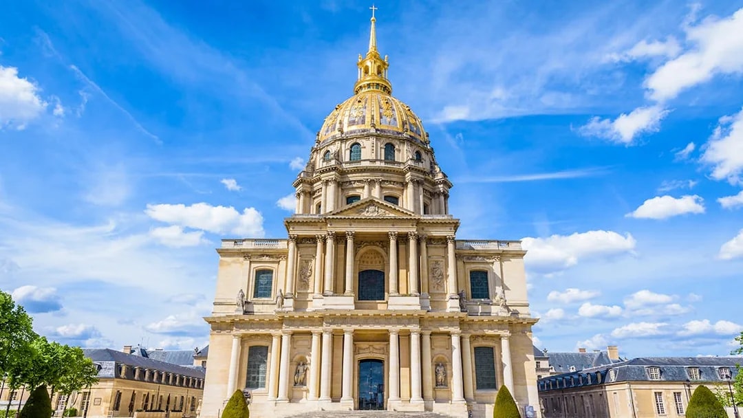Dome des Invalides in Paris with golden dome and historic architecture.