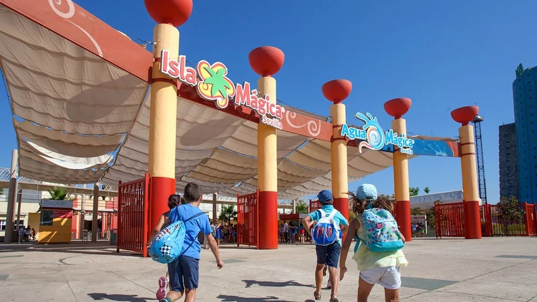 Children entering Isla Mágica amusement park in Seville, Spain.
