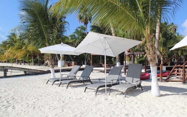 Isla Mujeres Premium Catamaran Tour with Snorkeling & Beach club Image 7