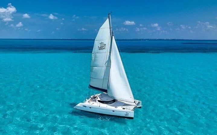 Isla Mujeres Premium Catamaran Tour with Snorkeling & Beach club Image 8