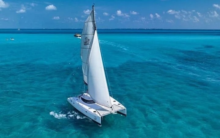 Isla Mujeres Premium Catamaran Tour with Snorkeling & Beach club Image 9