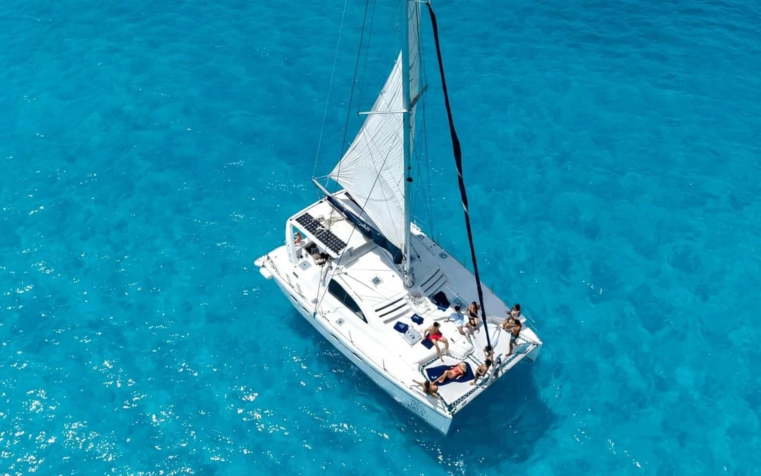 Isla Mujeres Tour with Catamaran, Snorkeling & Beach Club Image 1