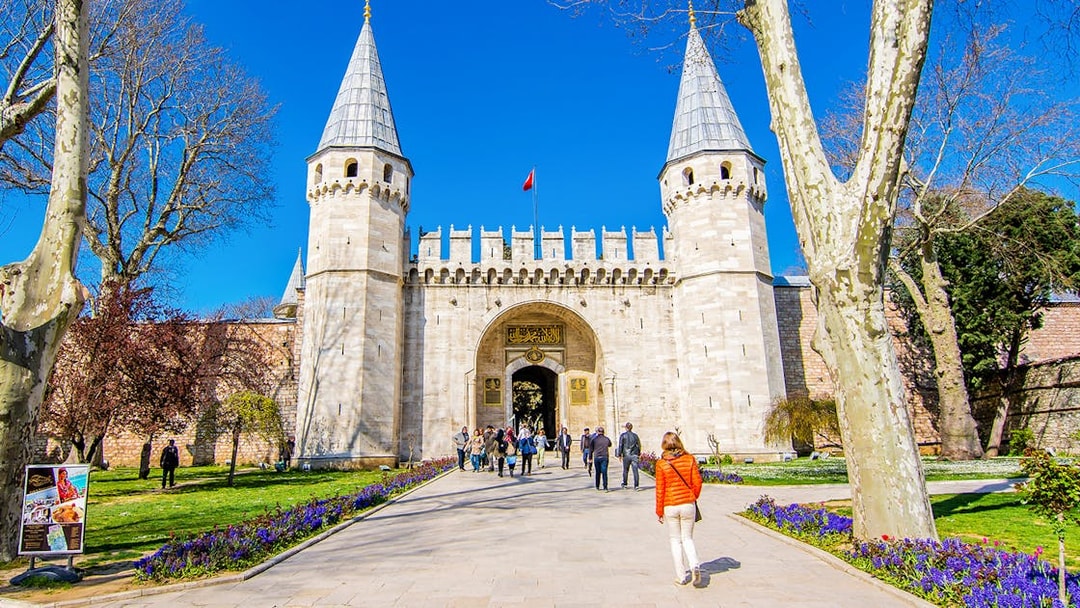Visitors entering the Gate of Salutation at Topkapi Palace, Istanbul.