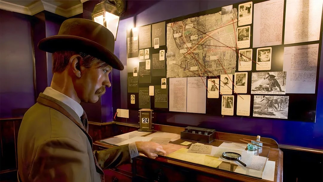 Detective mannequin examining Jack the Ripper case files at the Jack the Ripper Museum, London.