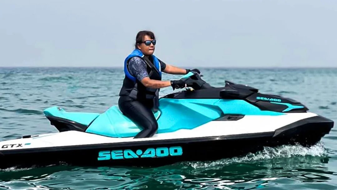 Person riding a jet ski on the ocean in Langkawi.