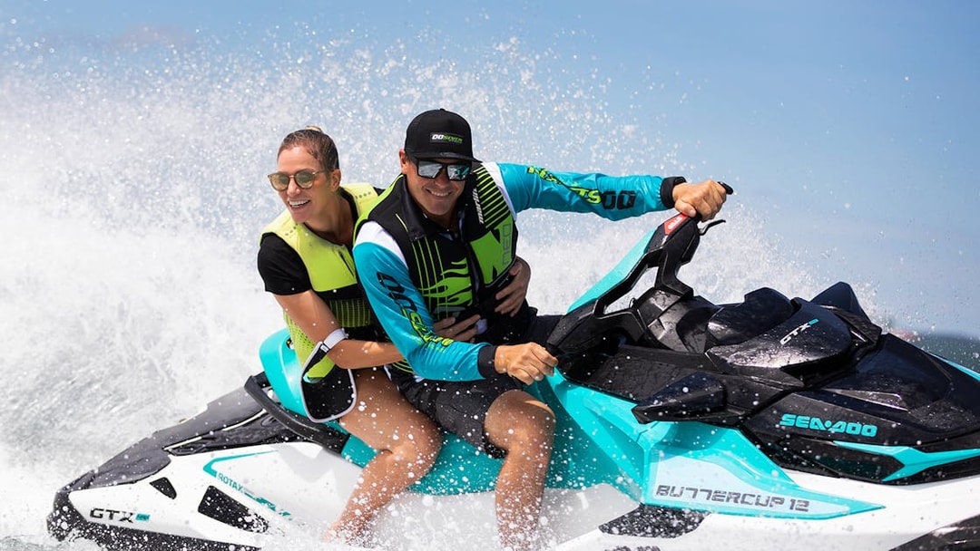 Jet ski riders enjoying a tour on the water in Darwin.