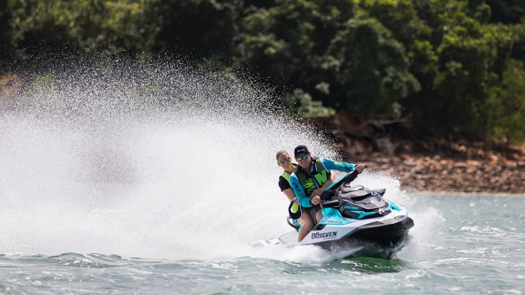 Jet ski riders enjoying a tour in Darwin waters.