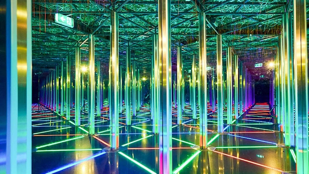 Jewel Changi Mirror Maze with colorful lights and reflective surfaces.