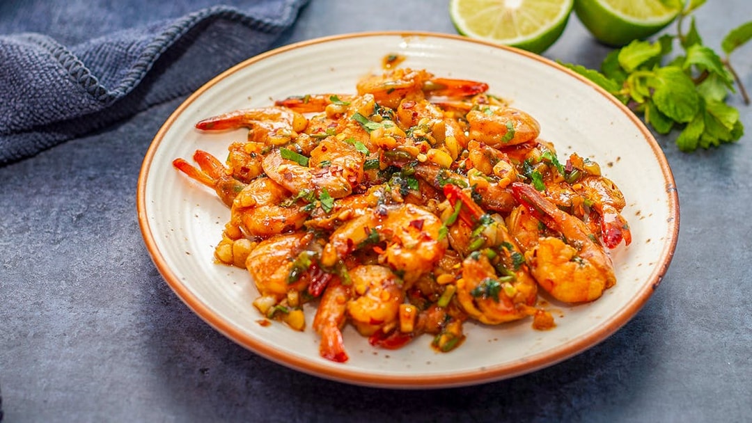 Grilled shrimp with herbs and spices, Jimbaran Bali seafood dinner.