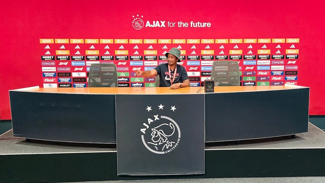 Press room at Johan Cruijff ArenA with Ajax branding, part of the Classic Tour experience.