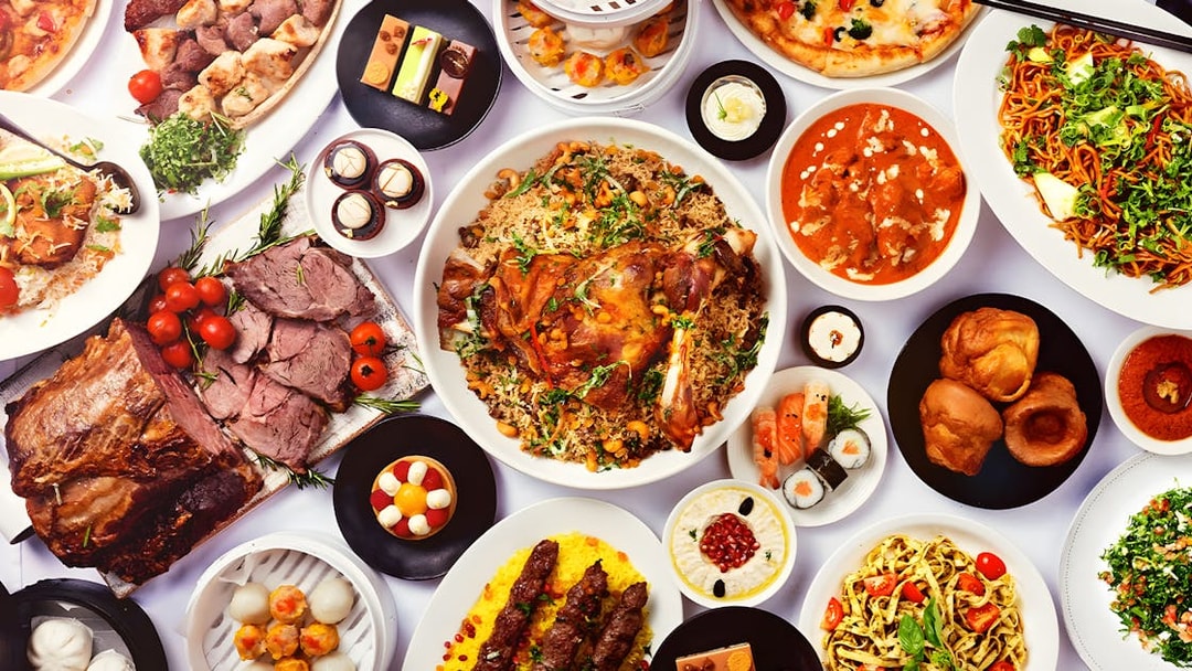 Variety of international dishes at Kaleidoscope Atlantis Dubai buffet.