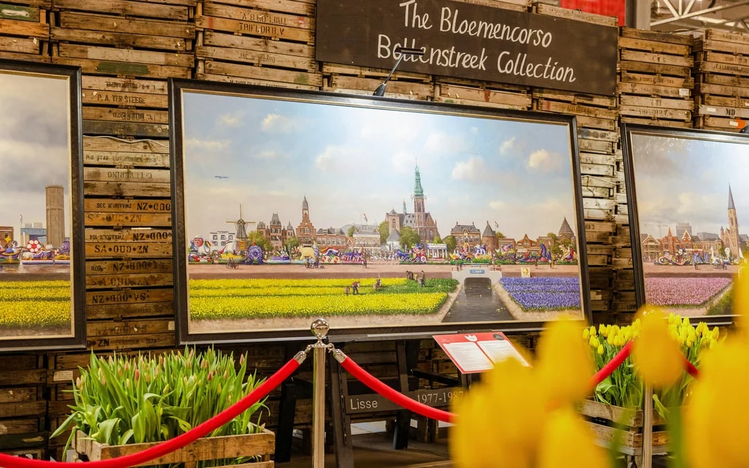 Art exhibition featuring Bloemencorso Bollenstreek paintings at Tulip Experience Amsterdam.