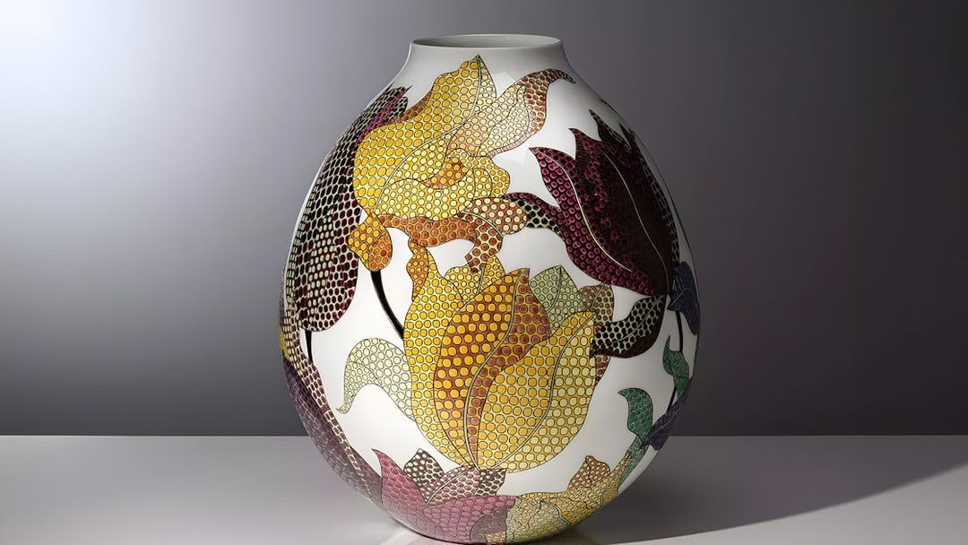 Porcelain pot with colorful floral patterns at Expressions in Blue exhibition, Kew Gardens.