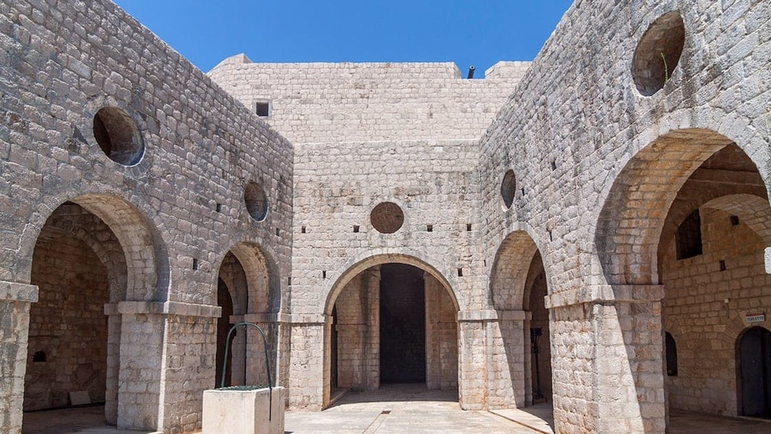 Stone arches and walls in Dubrovnik, Croatia, featured on the King's Landing Walking Tour.