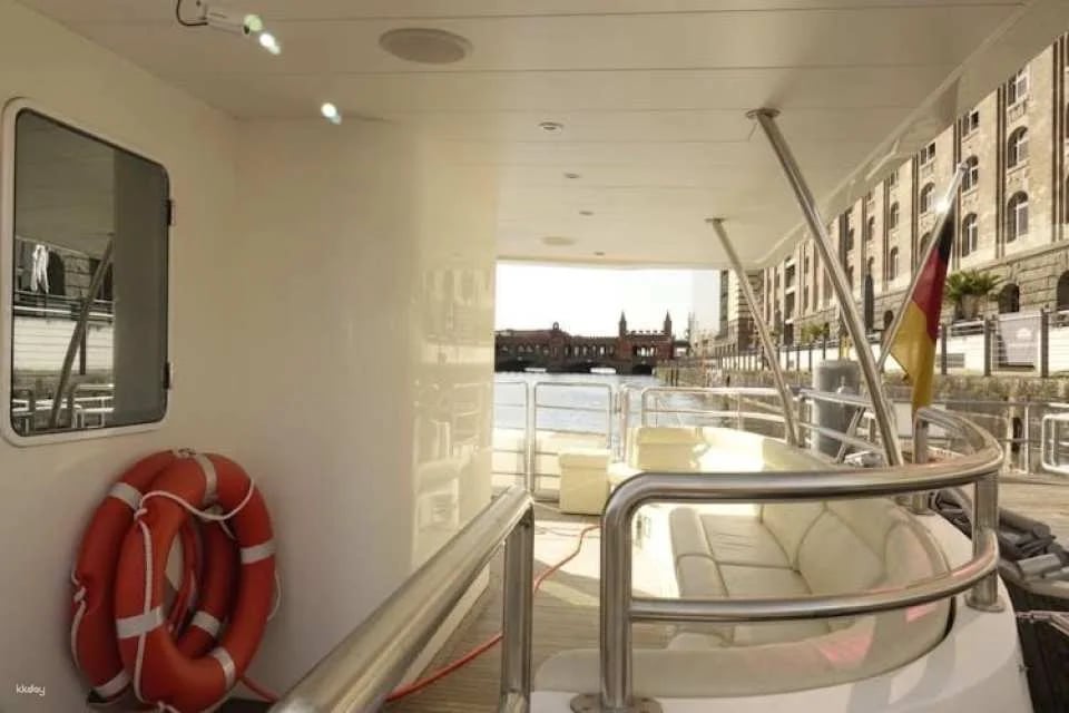 Solar-powered catamaran cruise on Berlin's Spree River at sunset