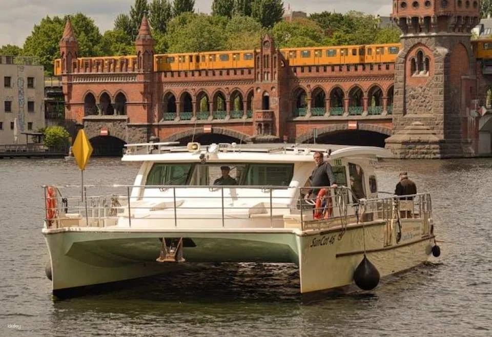 Solar-powered catamaran cruise on Berlin's Spree River at sunset