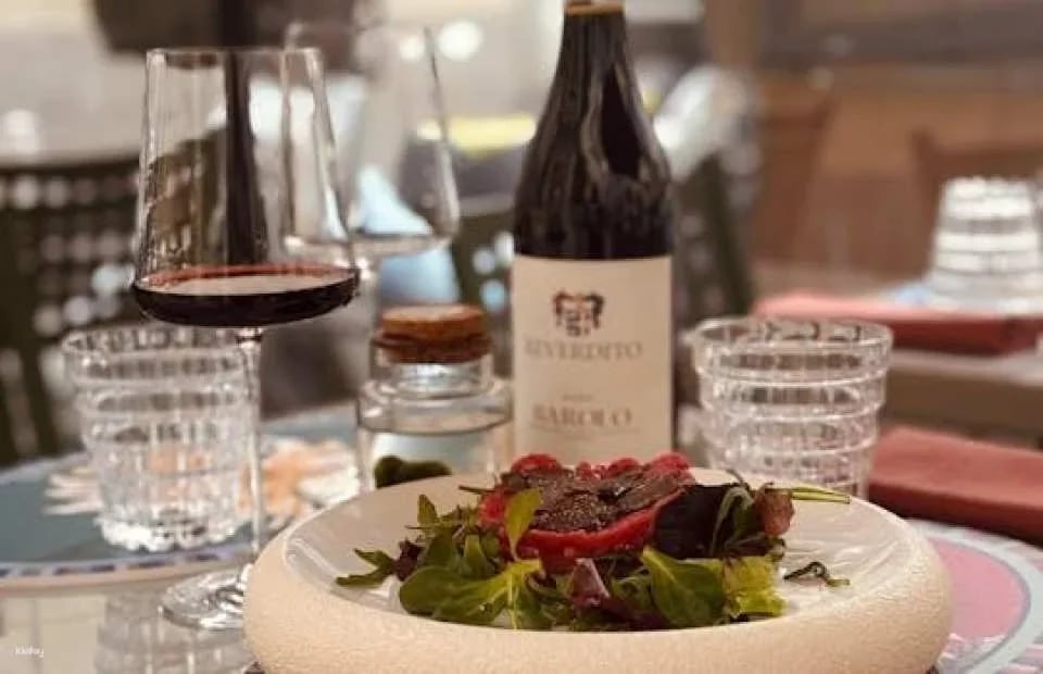 Food tour of traditional eateries and wine pairings (610457)