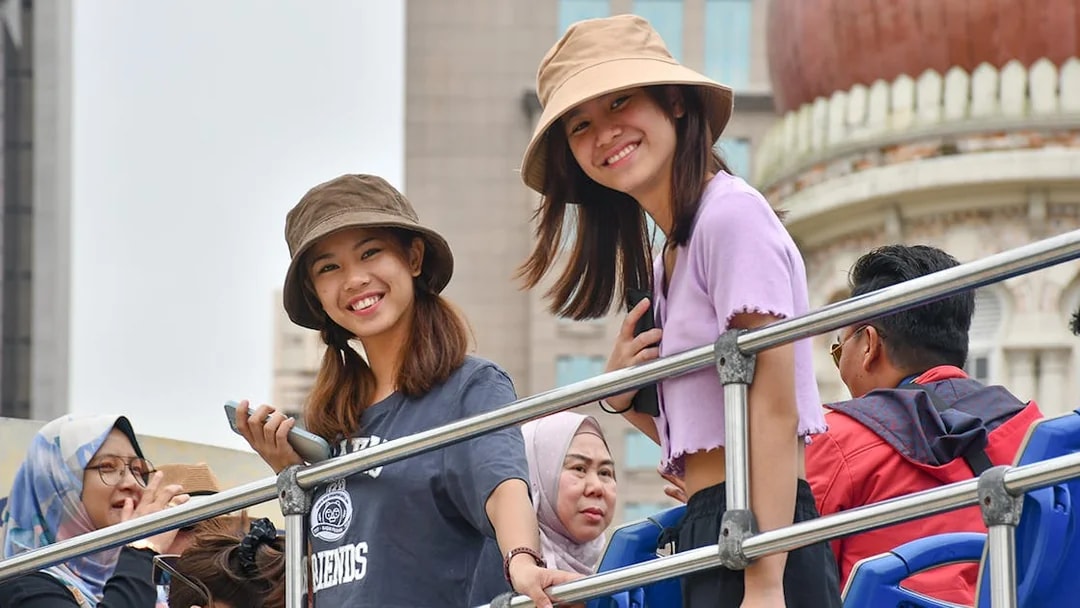 Passengers enjoying the Hop-On Hop-Off Tour in Kuala Lumpur.