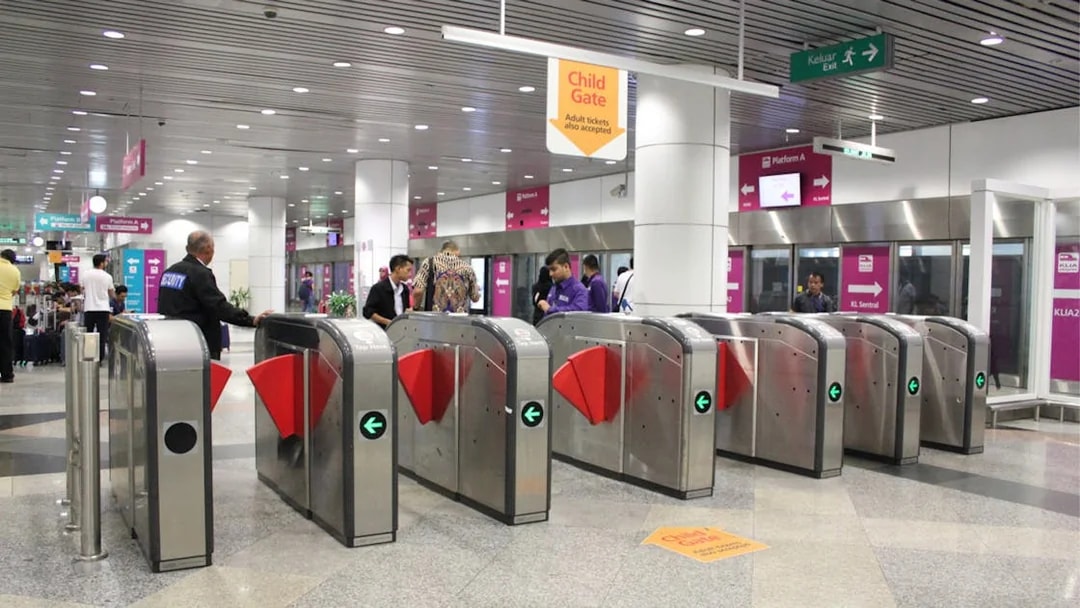 KLIA Express ticket gates at Kuala Lumpur station, Malaysia.