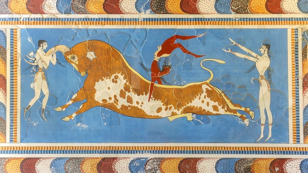 Bull-leaping fresco with two women and a man at Knossos Palace, Crete.