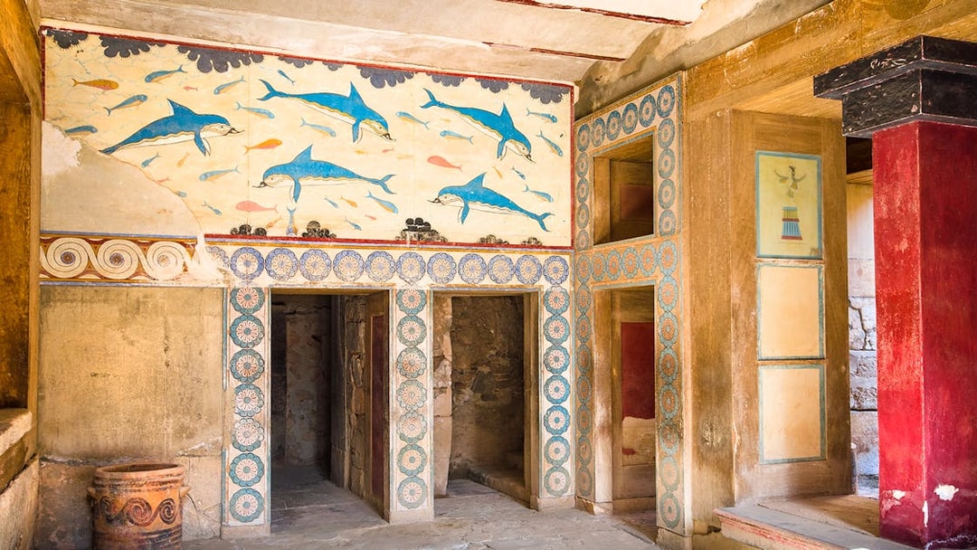Knossos Palace fresco with dolphins and geometric patterns, Crete archaeological site.