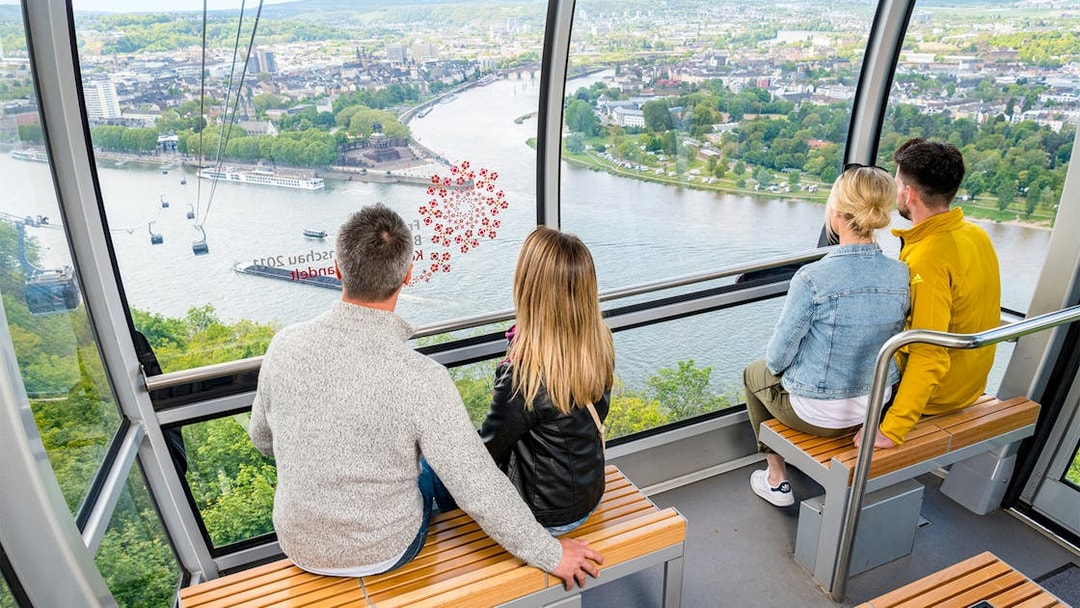 Guests enjoying the Koblenz skyline from a skyglide cabin.