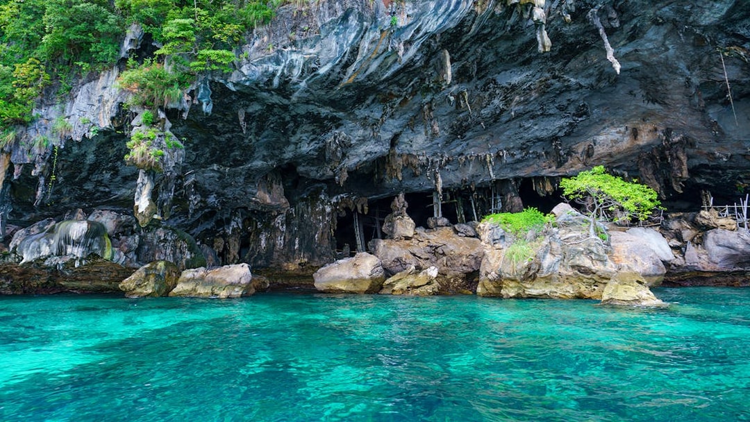 Viking Cave with turquoise water at Maya Bay, Phi Phi Island, Thailand.