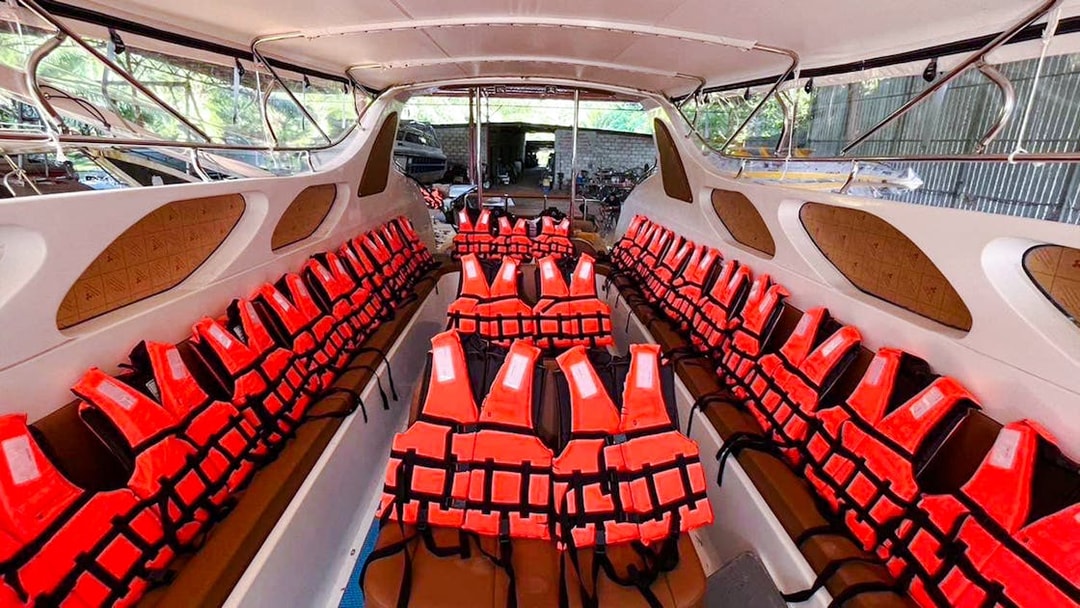 Interior of a speedboat with life jackets, Krabi to Phi Phi Islands tour.