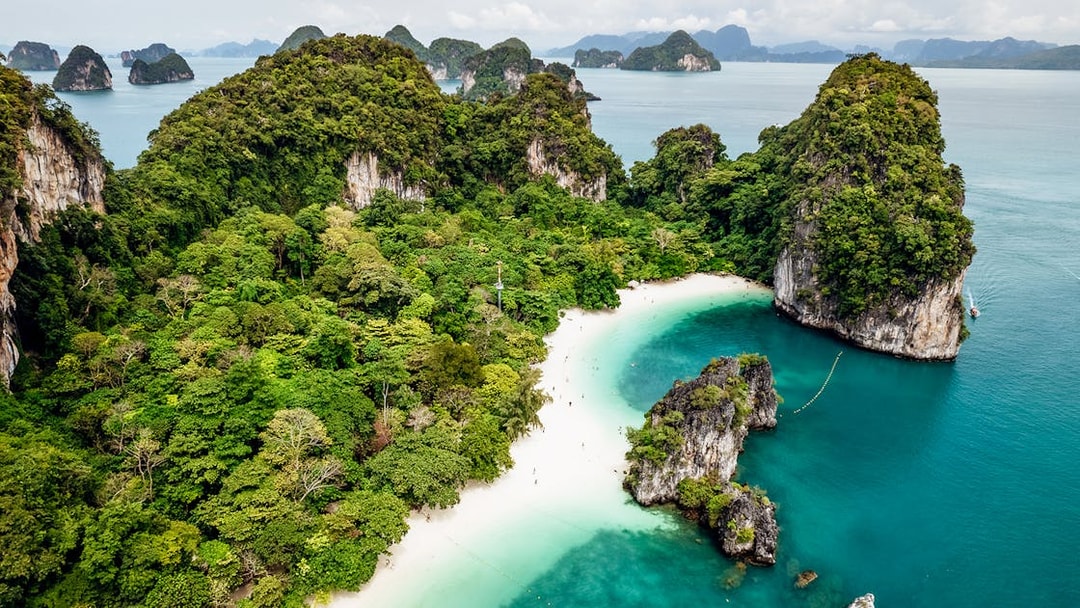 Aerial view of Krabi's lush islands and turquoise waters on a private longtail boat tour.