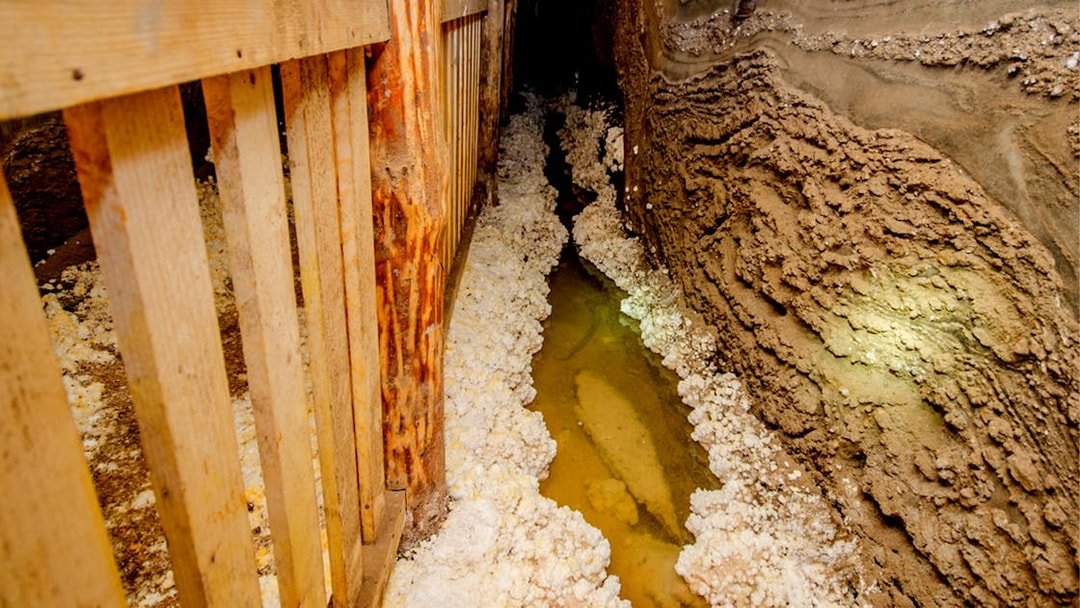 Underground passage with salt deposits in Bochnia Salt Mine, Poland.