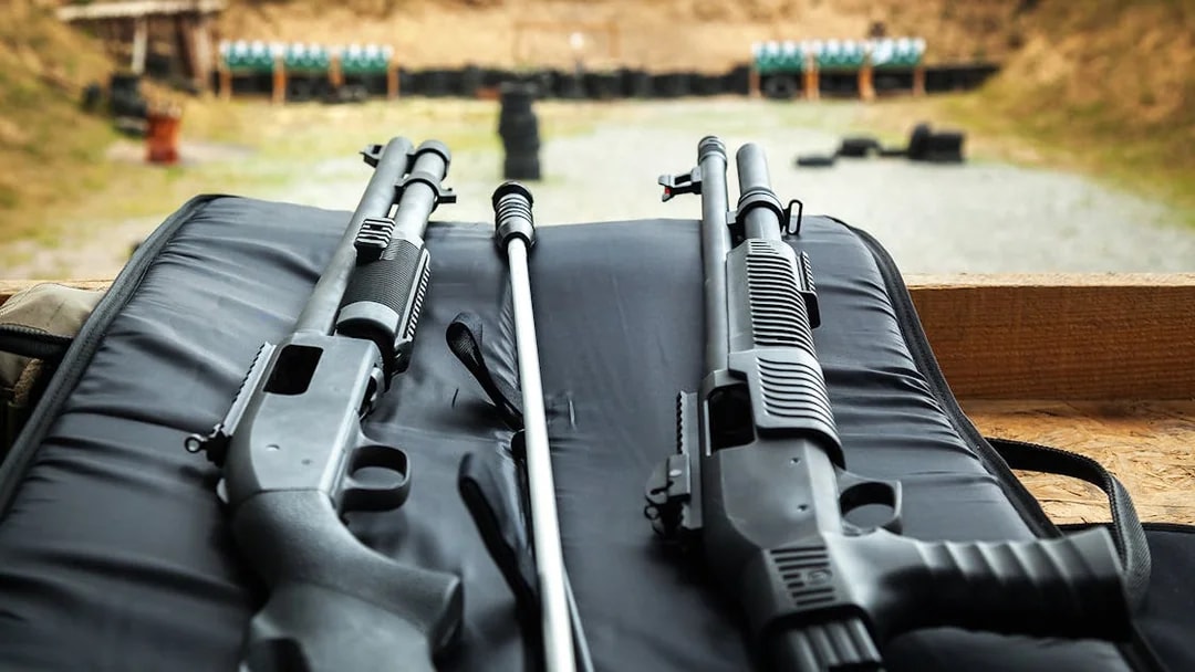 Shotguns on a bench at a shooting range in Krakow.