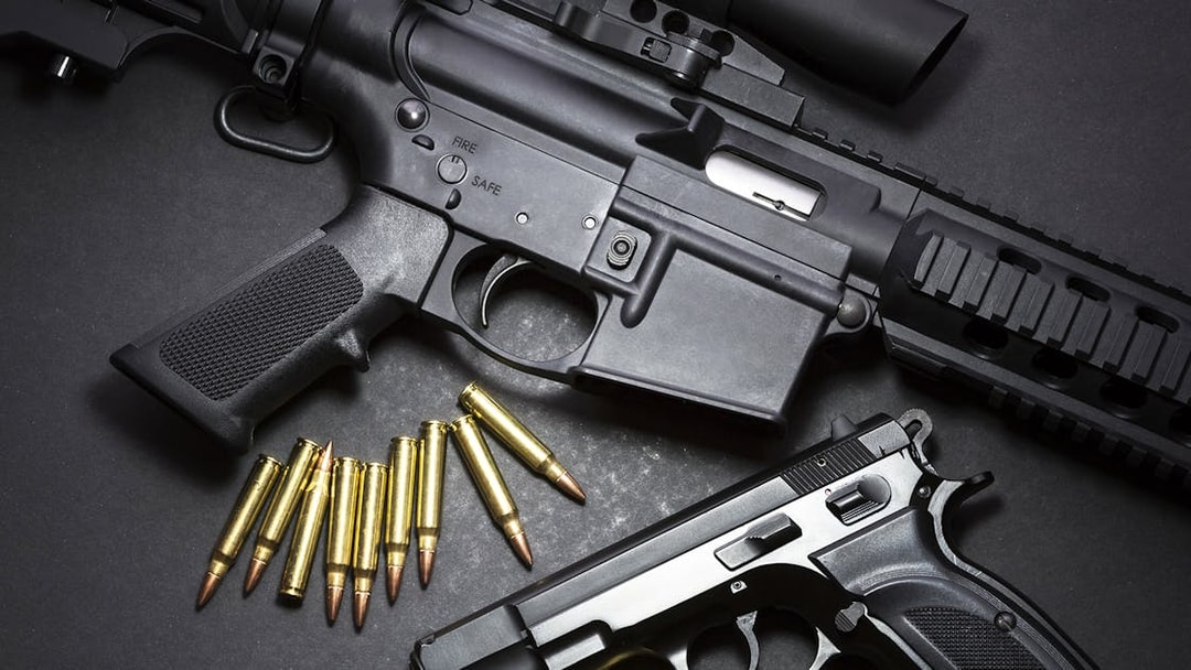 Rifles and bullets at an extreme shooting range experience with hotel transfer.
