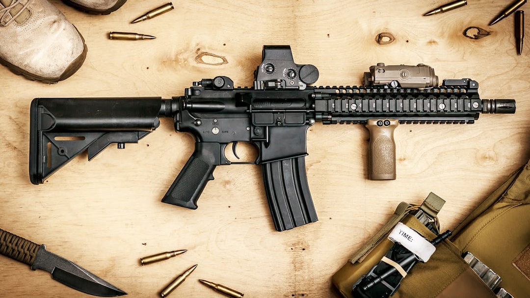Rifle and gear at extreme shooting range with hotel transfer.