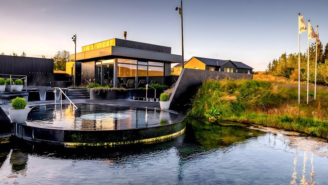Krauma Geothermal Baths with modern architecture and natural surroundings in Iceland.