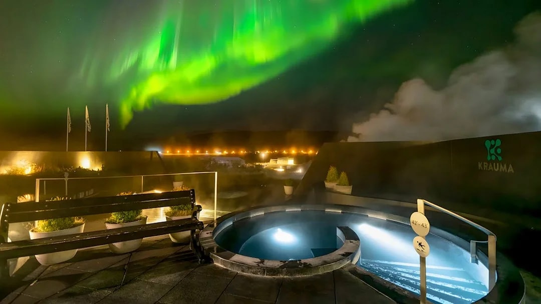 Krauma Geothermal Baths with Northern Lights in Iceland.