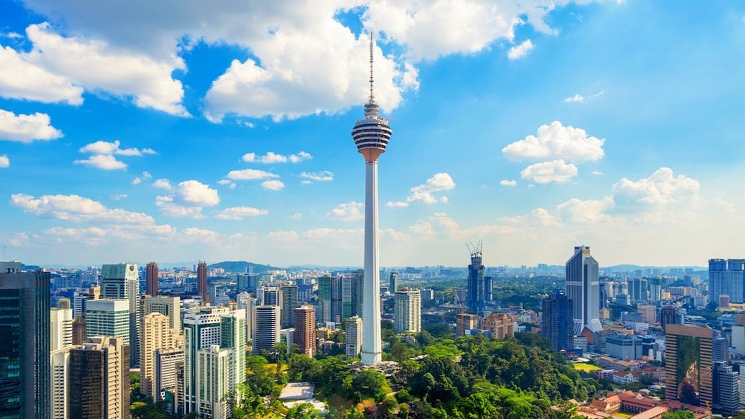 KL Tower overlooking Kuala Lumpur cityscape, Malaysia.