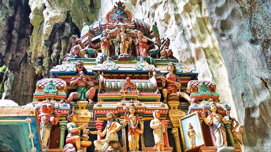 Colorful Hindu temple carvings inside Batu Caves, Malaysia.