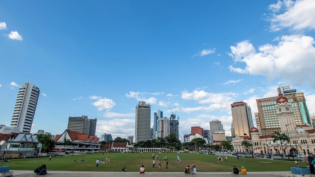 Kuala Lumpur cityscape with Sultan Abdul Samad Building and skyline during half-day city tour.