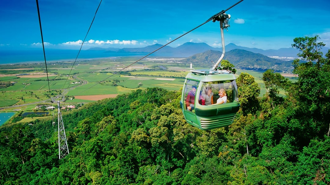 Kuranda Skyrail gliding over tropical rainforest in Cairns, Australia.
