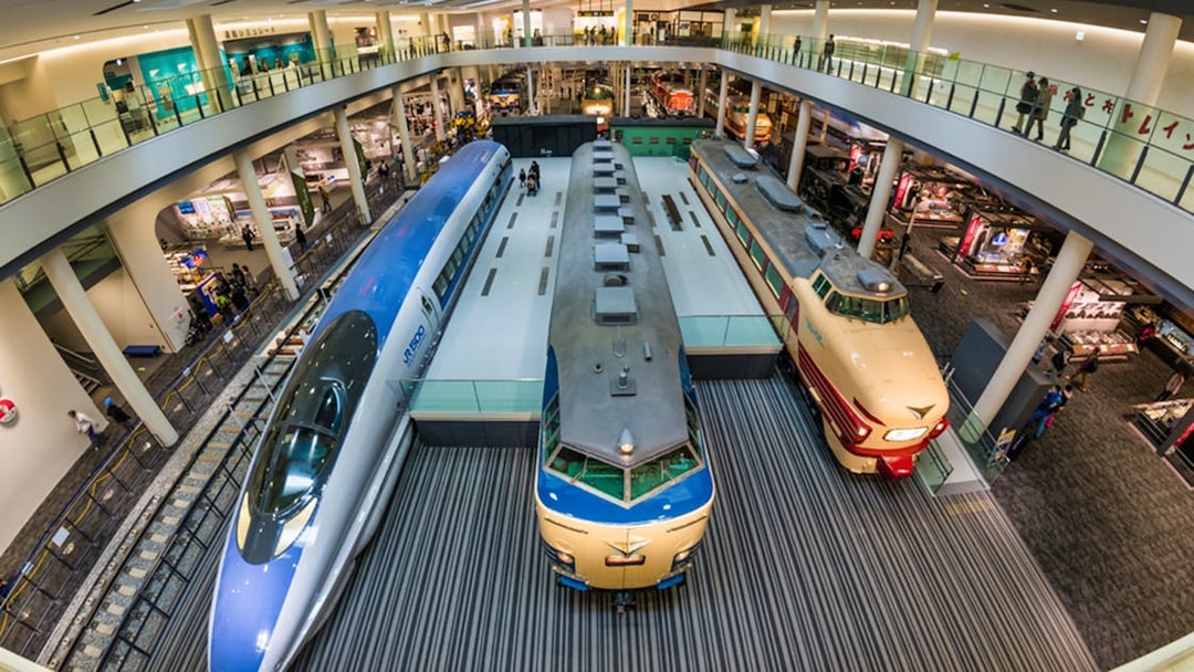 Kyoto Railway Museum interior with vintage trains on display.
