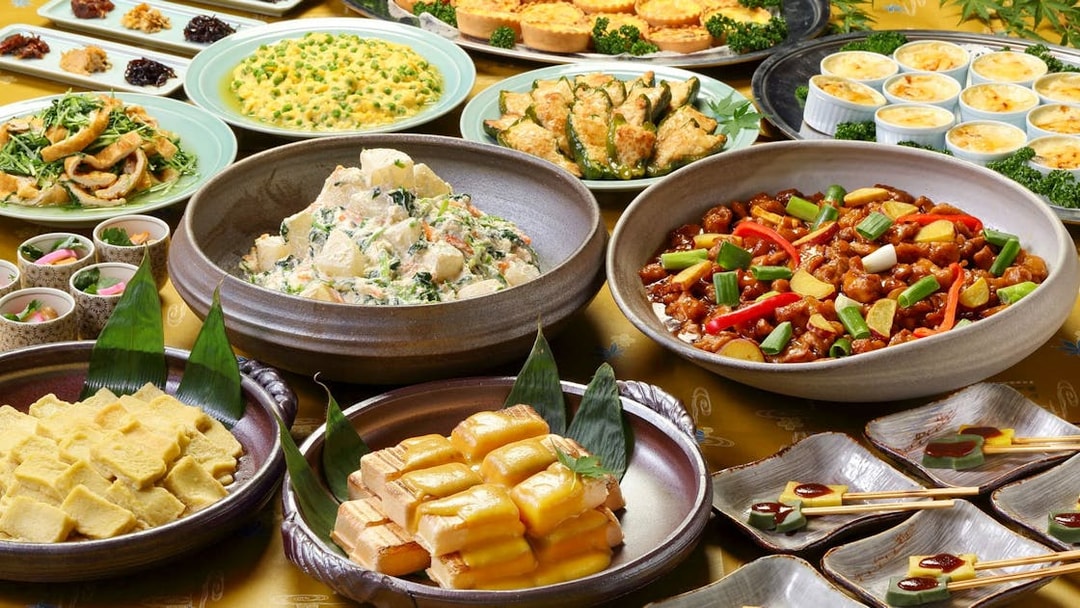 Traditional Japanese dishes served on Kyoto Sagano Romantic Train Day Tour from Osaka Umeda.