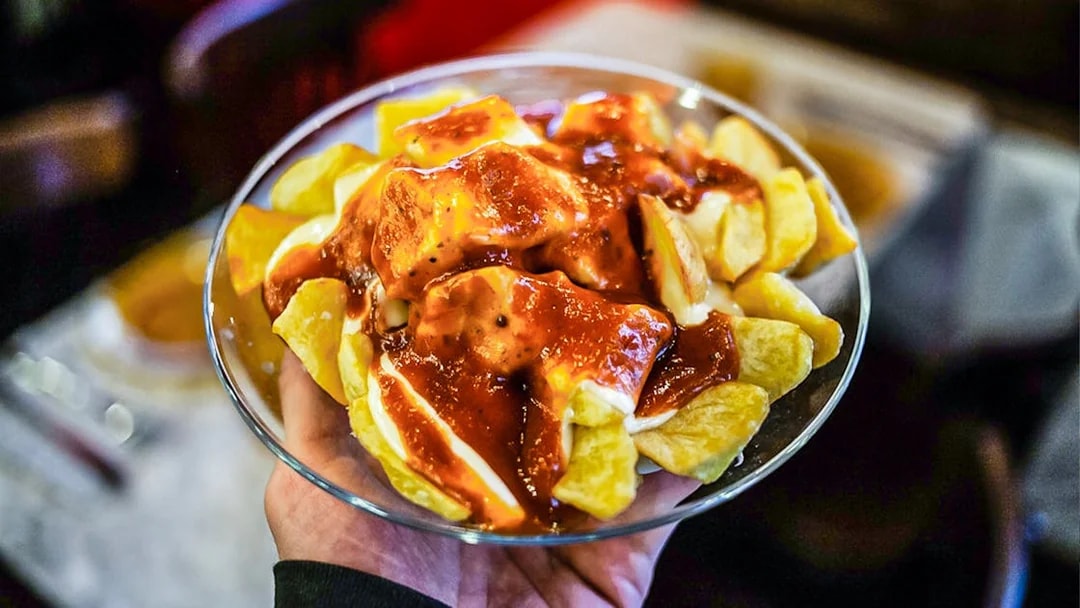 Patatas bravas served on a 3-hour guided food tour in La Barceloneta, Barcelona.